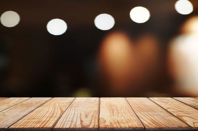 Close-up of illuminated lights on table