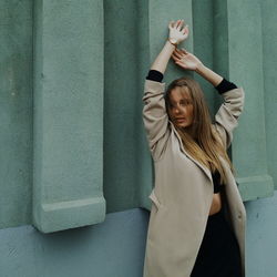 Full length of a smiling young man