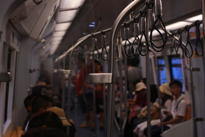 Group of people in metro train