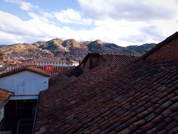 Houses in town against sky