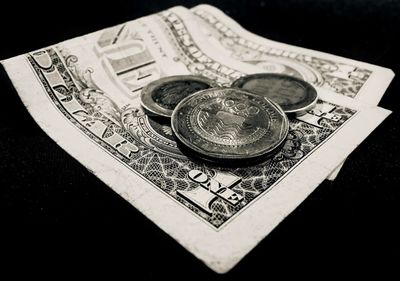 High angle view of coins on table