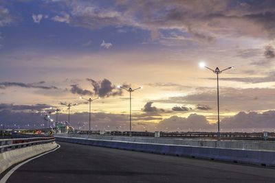 Road against sky at sunset