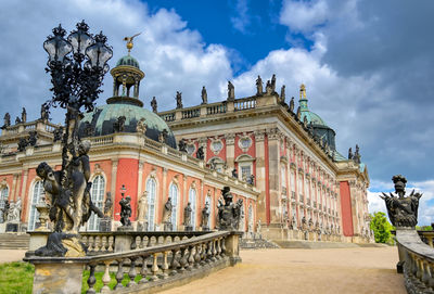 Statue of historic building against sky