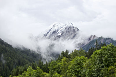 Low angle view of majestic mountains against sky