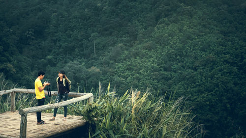 Couple on observation point at mountain