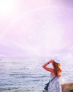 Woman standing on beach