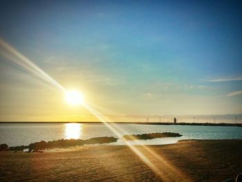 Scenic view of sea at sunset