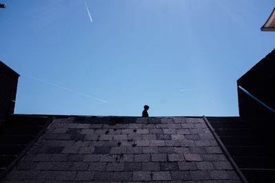 Low angle view of building against blue sky