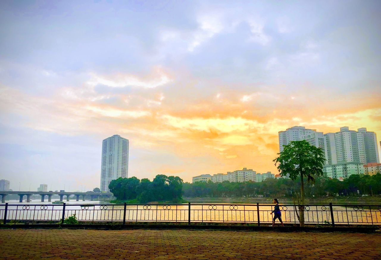 MODERN BUILDINGS IN CITY AGAINST SKY