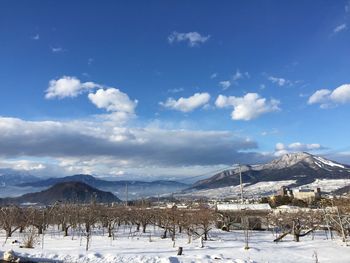 Scenic view of snowcapped mountains against sky