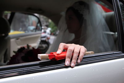 Close-up of man in car