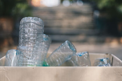 Close-up of water bottle on table