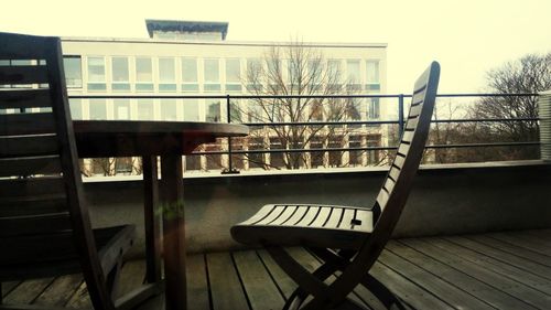 Empty chairs in balcony