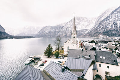 High angle view of buildings and mountains against sky