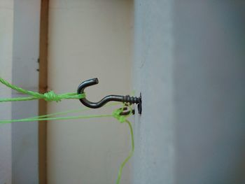 Close-up of metal against wall