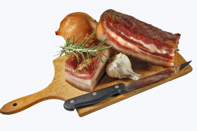 High angle view of bread on cutting board