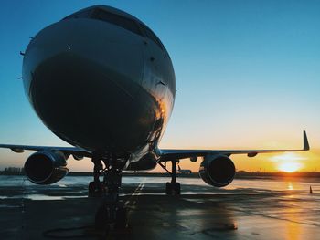 View of airplane at sunset