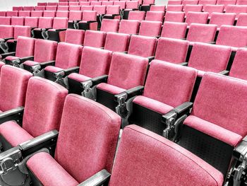 Empty red seats in auditorium