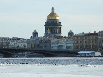 View of buildings against sky in city