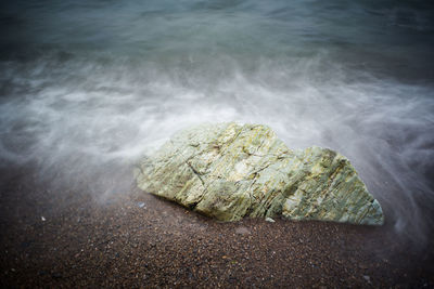 Waves splashing on rocks