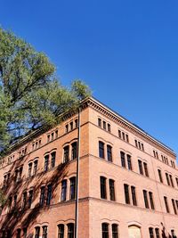 Low angle view of building against clear sky