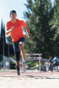 Full length of young man running