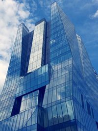 Low angle view of modern building against sky