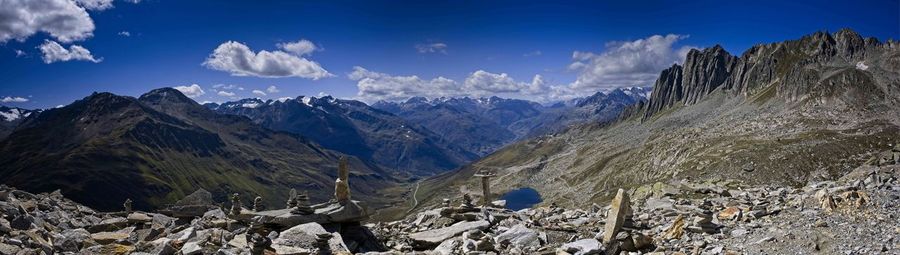 Panoramic view of snowcapped mountains against sky