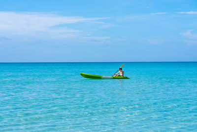 Boat in sea against sky