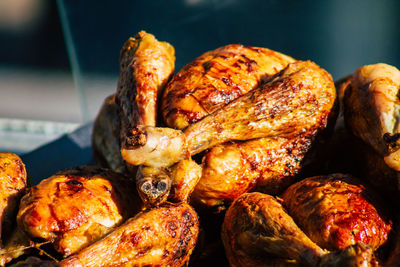 High angle view of roasted meat on barbecue grill