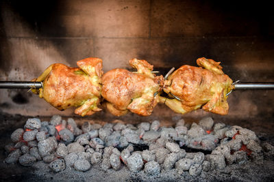 Close-up of meat on barbecue grill