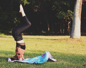 Low section of woman on grass