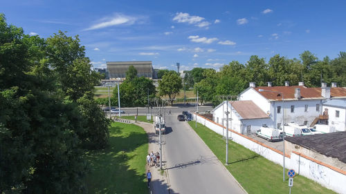 High angle view of trees and buildings against sky