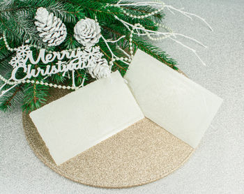 High angle view of christmas decorations on white background