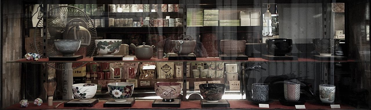 indoors, shelf, still life, large group of objects, variation, table, retail, arrangement, choice, order, food and drink, abundance, domestic kitchen, store, stack, collection, bottle, kitchen utensil, glass - material, for sale