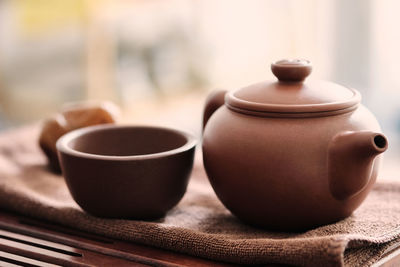 Close-up of teapot on table