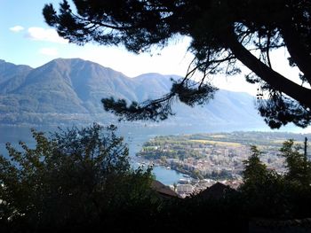 Scenic view of mountains against cloudy sky