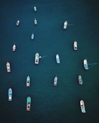 High angle view of sailboats on sea