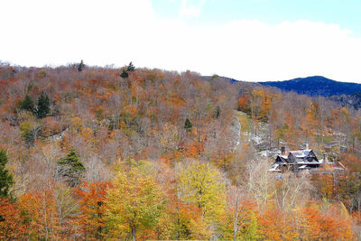 Scenic view of land against sky during autumn