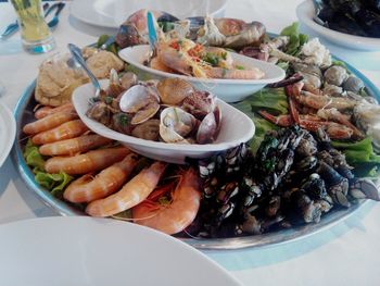 Seafood served on table at restaurant