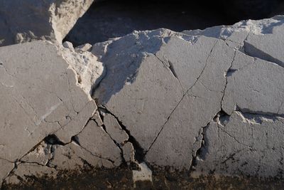High angle view of cracked retaining wall