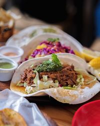 Close-up of food served on table