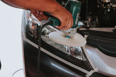 Midsection of person working in office