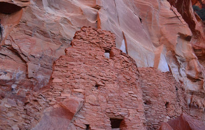 Gorgeous ruins of cliff dwellings made of red rock near sedona arizona.