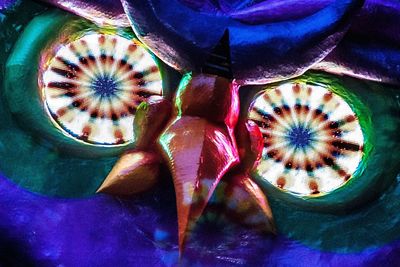 Low section of woman wearing multi colored light