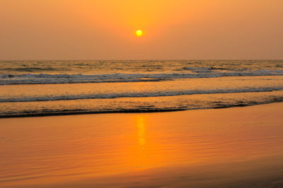 Scenic view of sea at sunset