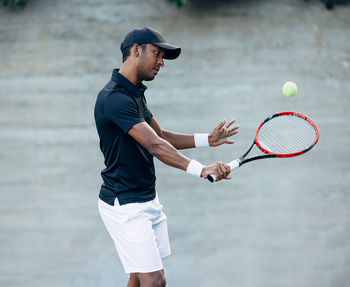 Man playing tennis