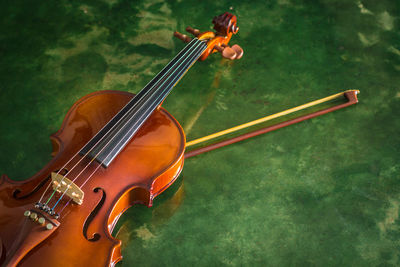 High angle view of violin on table