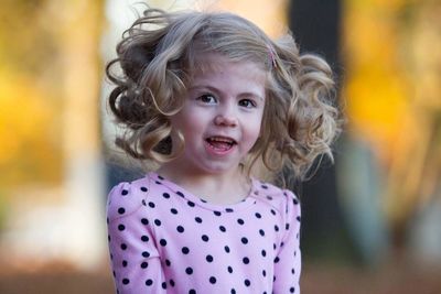 Close-up portrait of smiling girl