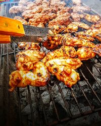 Close-up of meat on barbecue grill